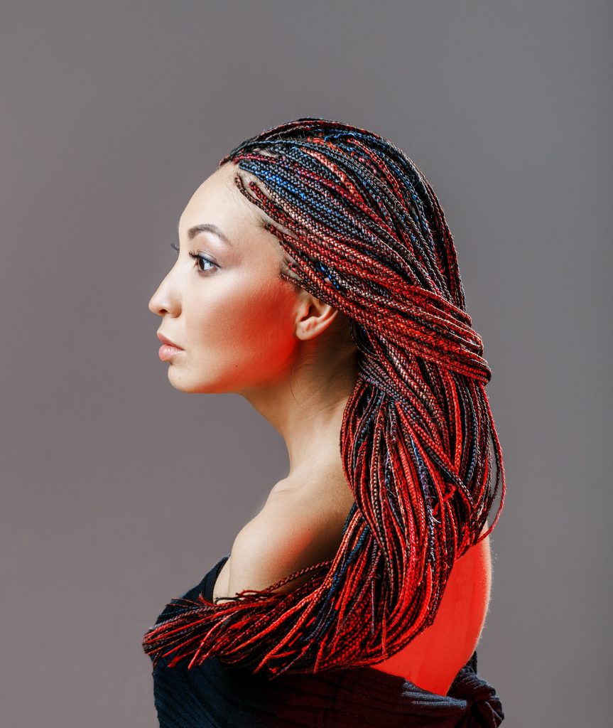 beautiful black woman with colored braids - pH Plex blog on Fall/Halloween Hair