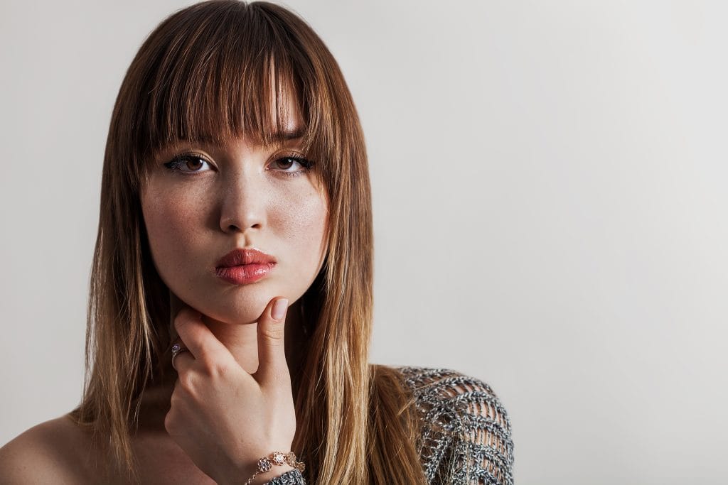 Gorgeous girl portrait with freckles, long hair and bangs -pH Plex